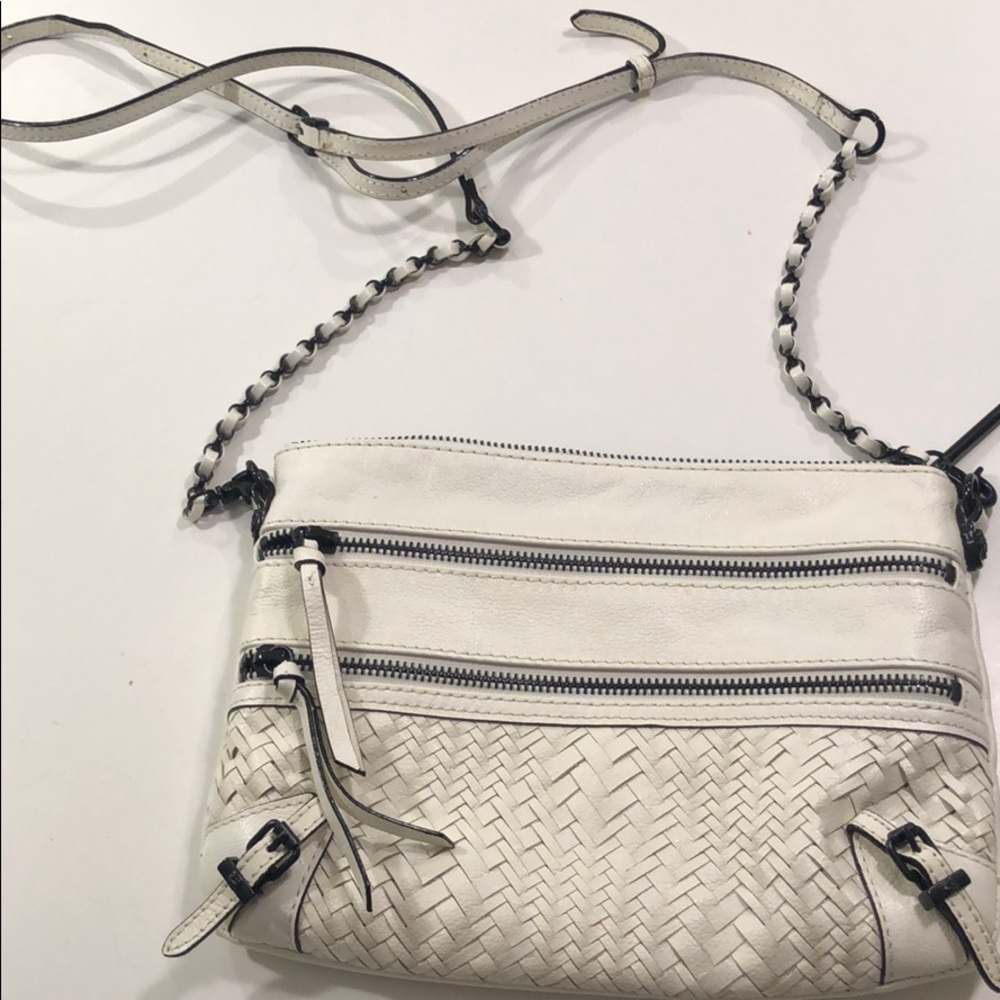 White crossbody bag with black metal